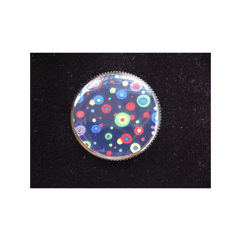 Fancy ring, multicolored polka dots on a black background, set with resin