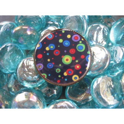 Fancy ring, multicolored polka dots on a black background, set with resin