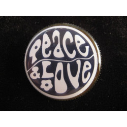Vintage brooch, Peace and love, on black background, set with resin