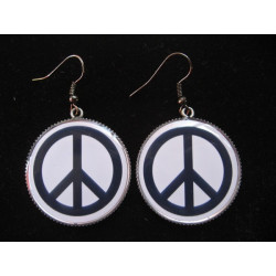 Peace and love earrings on white background, set in resin