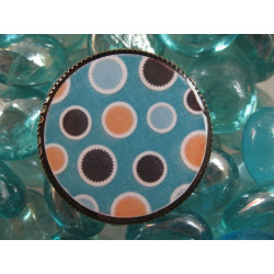 Fancy ring, orange dots on turquoise background, set with resin