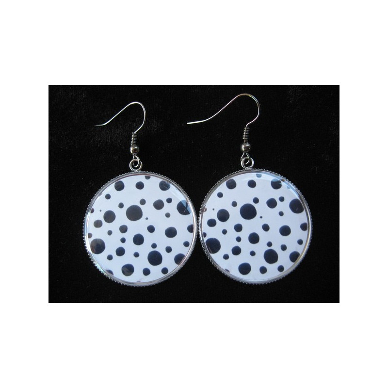 Earrings, black dots on a white background, set in resin