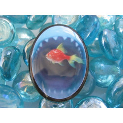 Oval brooch, fish and shark, set with resin