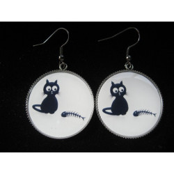 Fancy earrings, cat and fishbone, set in resin