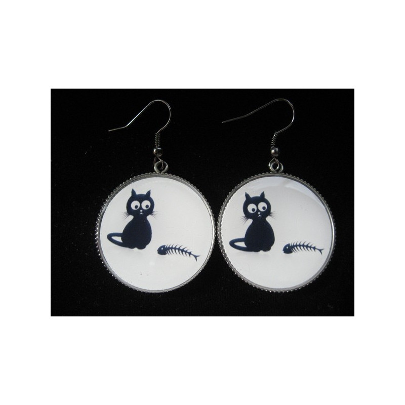 Fancy earrings, cat and fishbone, set in resin