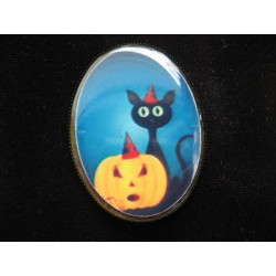 Oval brooch Halloween, black cat and pumpkin