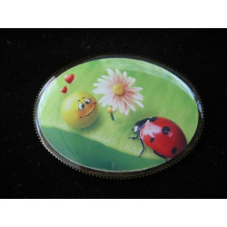 Oval brooch, Smiley in love, set with resin