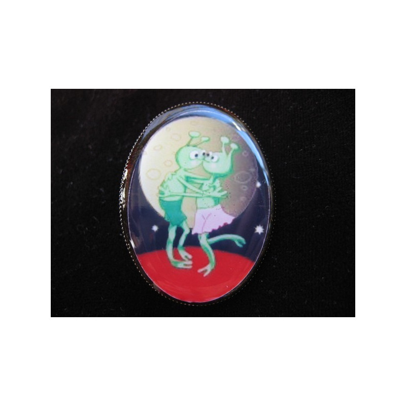 Oval brooch, extraterrestrial love, set in resin