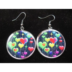 Earrings, multicolored hearts on black background, set in resin
