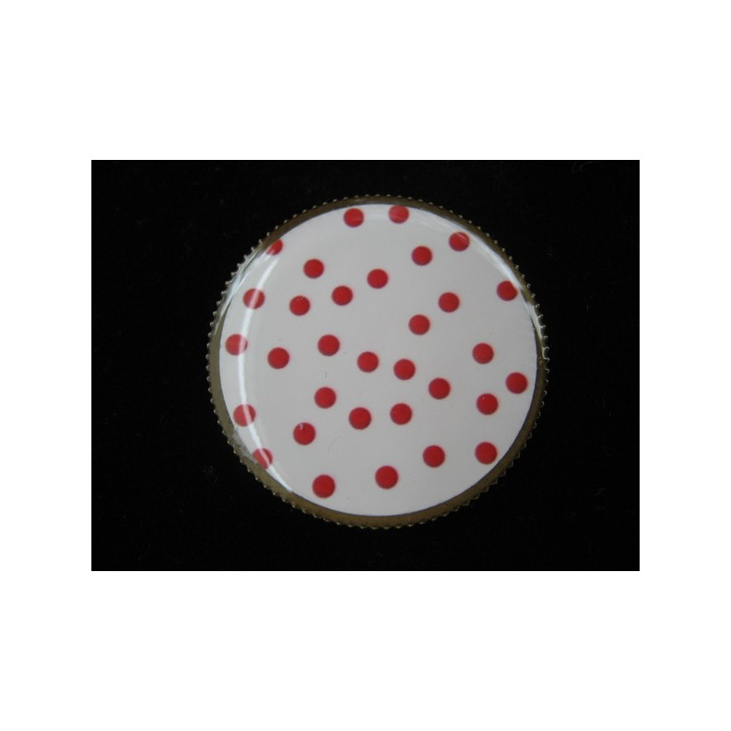 Fancy ring, red polka dots on a white background, set with resin