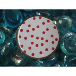 Fancy ring, red polka dots on a white background, set with resin