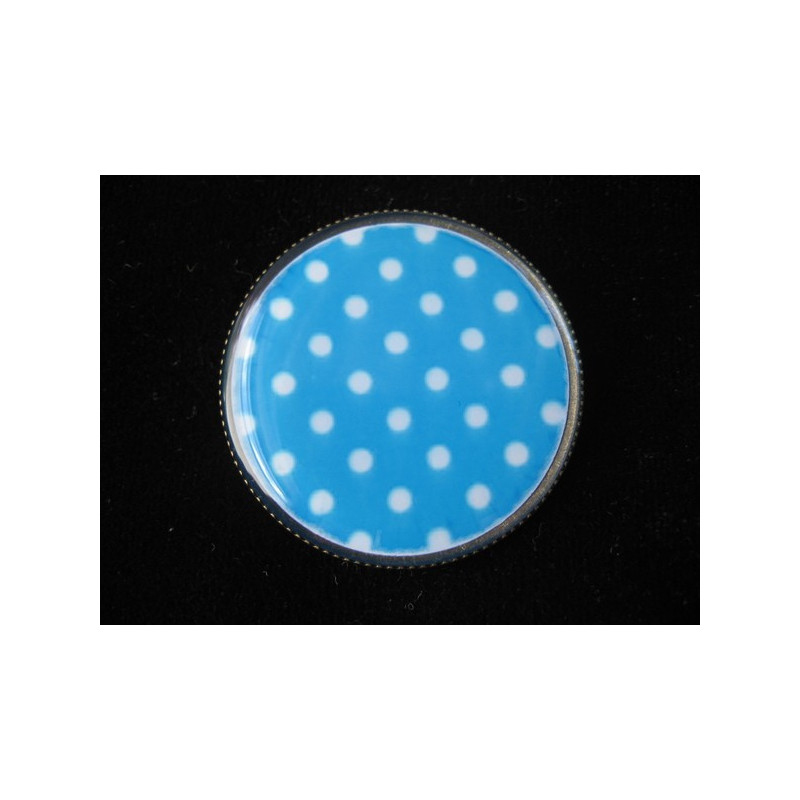 Fancy ring, white dots on a turquoise background, set with resin