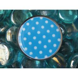 Fancy ring, white dots on a turquoise background, set with resin