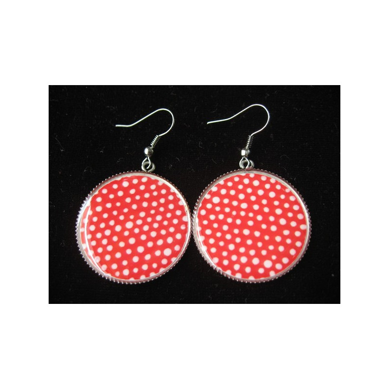 Earrings, white dots on red background