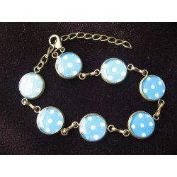 Small cabochons bracelet, white polka dots on a turquoise background