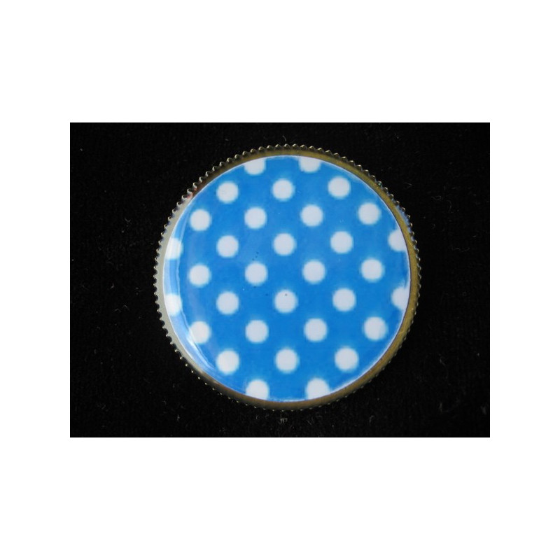 Fancy ring, white dots on a blue background, set with resin