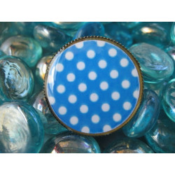 Fancy ring, white dots on a blue background, set with resin