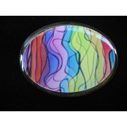 Oval brooch, multicolored patterns, set with resin