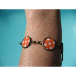 Bracelet petits cabochons, pois blancs sur fond orange