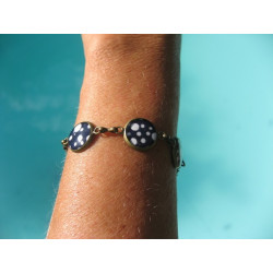 Bracelet petits cabochons, petits pois blancs sur fond noir