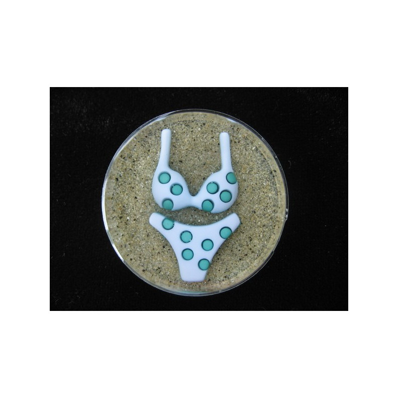 Large summer ring, blue bikini, on a resin sand background