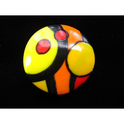 Large ring, multicolored cabochon on a black background in fimo
