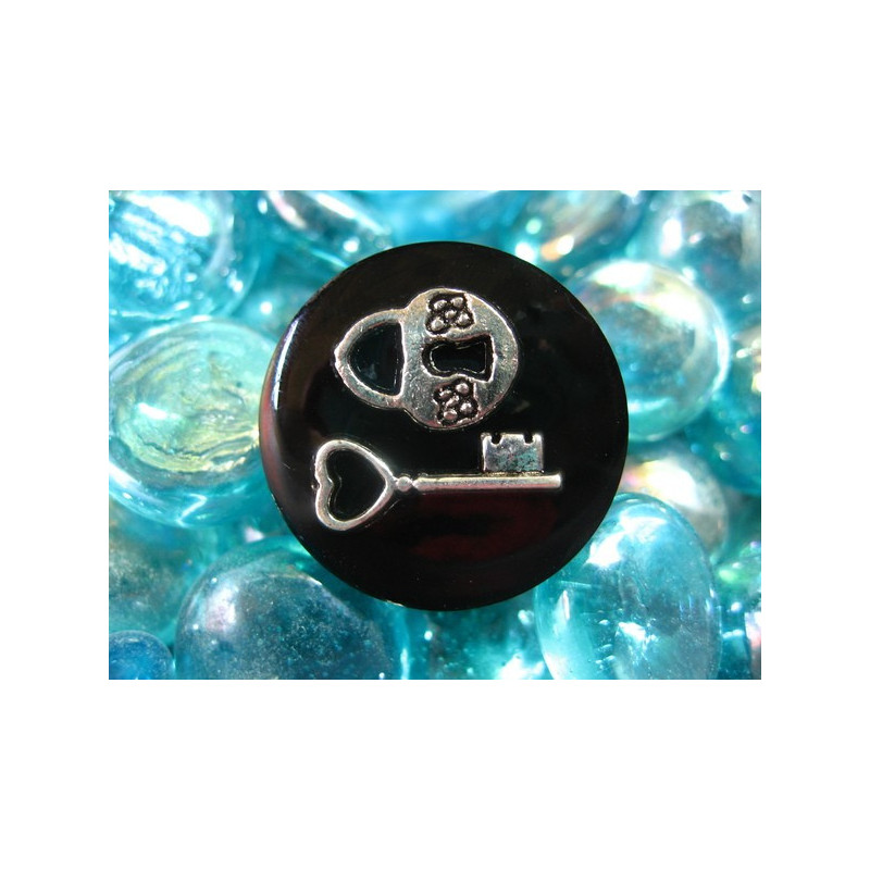 Fancy ring, the key to happiness, on black resin