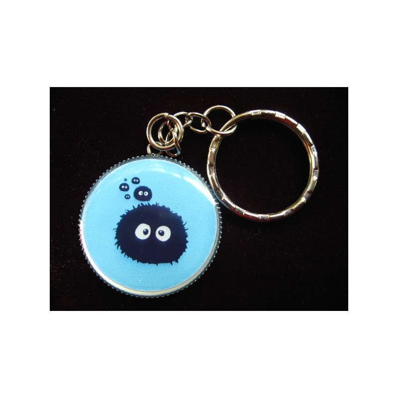 Fancy keyring, furball on blue background, set in resin