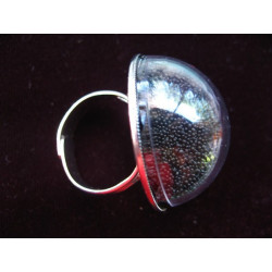 Dome ring, mobile black microbeads, in a plexi half-sphere