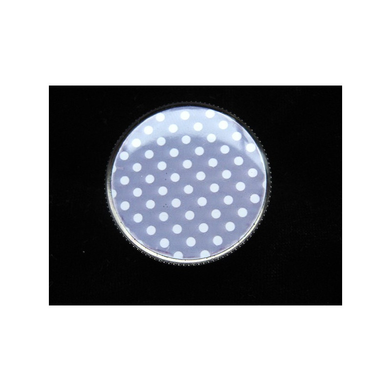 Fancy ring, white dots on dark gray background, set with resin