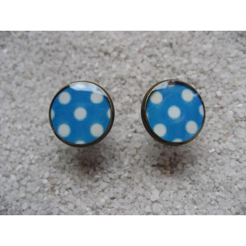 Cufflinks, white dots on a blue background, set in resin
