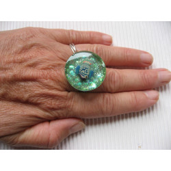 Summer ring, tropical fish in love, on a glittery blue background in resin