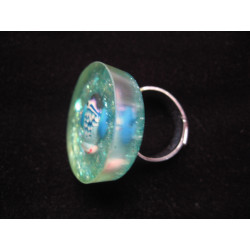 Summer ring, tropical fish in love, on a glittery blue background in resin