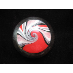 Very large cabochon ring, white and red spiral, on transparent resin background
