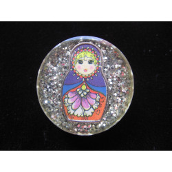 Fancy ring, Russian doll, on a silver resin background