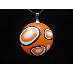 Pop pendant, black and white patterns on an orange background, in fimo