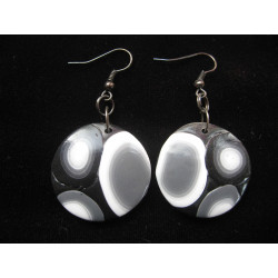 Graphic earrings, white and black patterns on a black background, in fimo