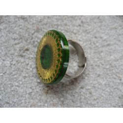 Fancy RING, gold print, on green resin background