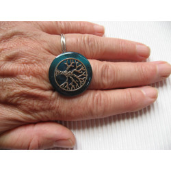 Zen ring, silver tree of life, on blue resin background