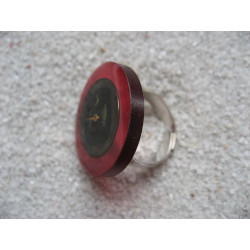 Vintage RING, black watch dial, on fuchsia resin background