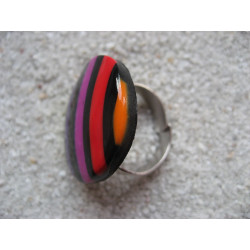 BAGUE ajustable, rayures multicolores sur fond noir