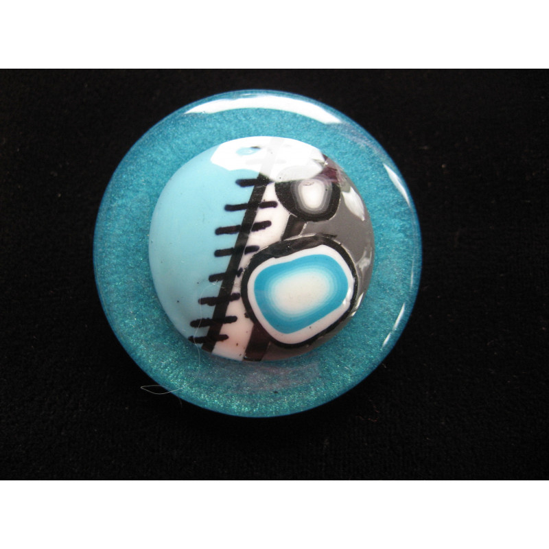 Very large ring, turquoise and gray cabochon in fimo, on turquoise resin background