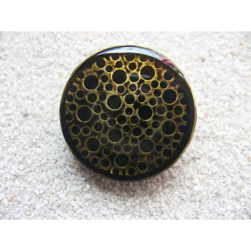 Large ring, perforated bronze print, black resin background