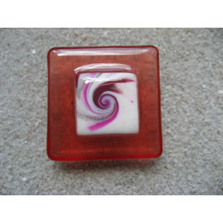 Very large square ring, white fuchsia spiral cabochon, on a red resin background