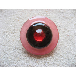 Large graphic ring, red pearl, on black and red resin background