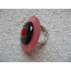 Large graphic ring, red pearl, on black and red resin background