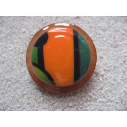 Large graphic ring, geometric cabochon in Fimo, on an orange resin background