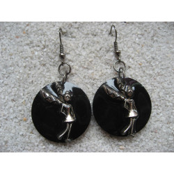 Fancy earrings, Tinker Bell, on black resin background