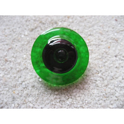 Fancy RING, green pearl, on black and green resin background
