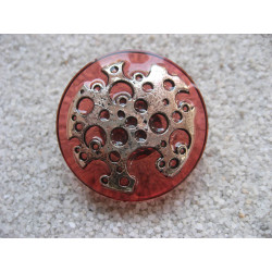 Large ring, silver stamp with holes, on a red resin